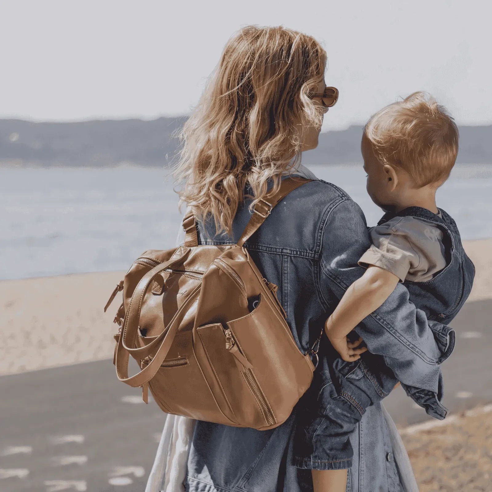 Shop Hannah and Henry's best-selling nappy bag backpack. The perfect baby bag for new parents on the go in Australia.